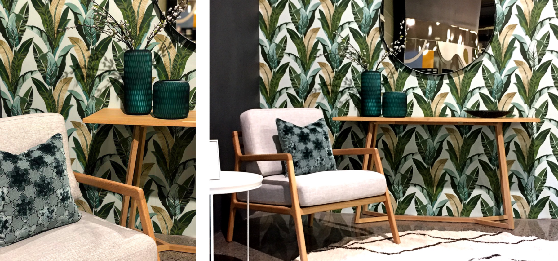 modern scandi grey chair with wood arms, wood console table, round black mirror and banana leaf wallpaper