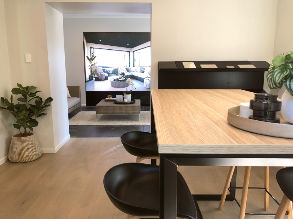 timber top bar leaner and modern stools in room with wood floors