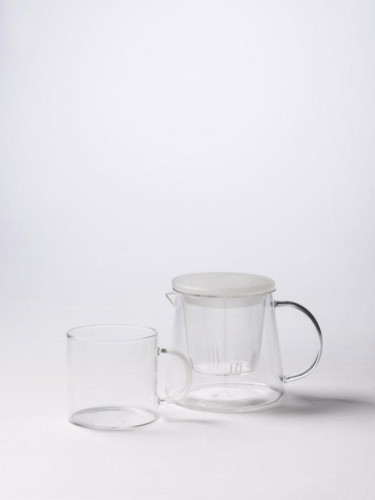 clear glass mug and teapot with frosted handle