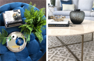 marble coffee table and blue velvet ottoman with coffee table books