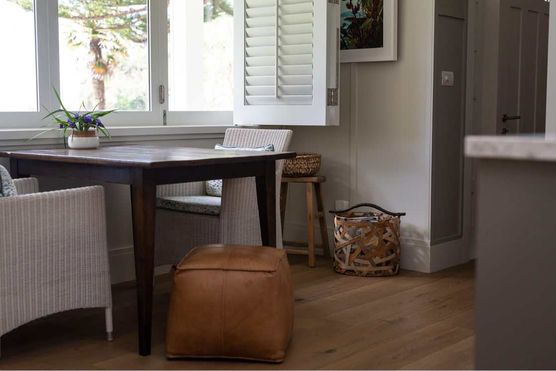 dining room nook with window shutters