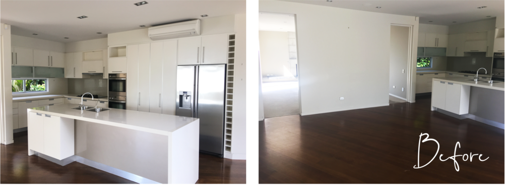 plain white kitchen with chrome tap and dark wood floors